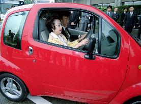 Ogi tries low-emission car